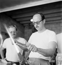 Harvey Littleton Lampworking at the June 1962 Toledo Workshop. Photograph by Robert Florian. Nils Carlson (l) and Harvey Littleton (r). Gift of Robert Florian.  CMGL 1000068776